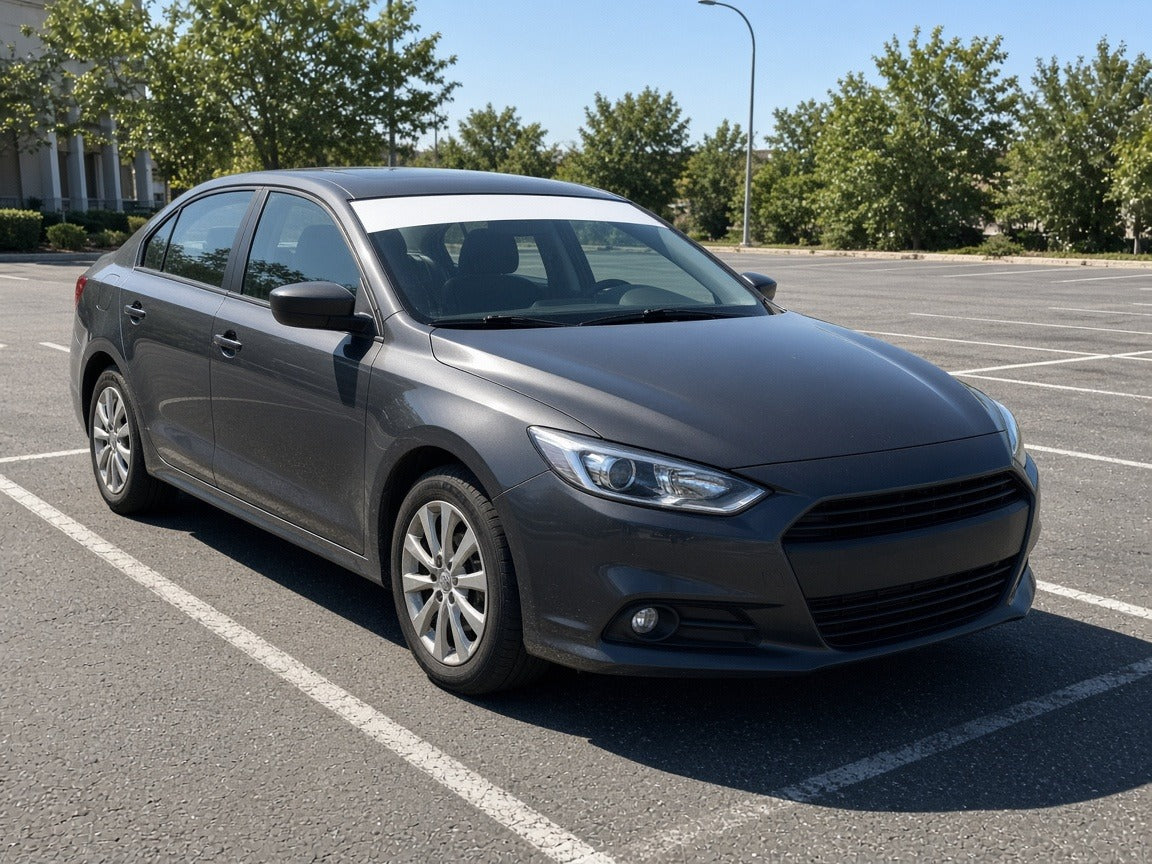 Custom vinyl windshield banner strip across the top of a sedan windshield