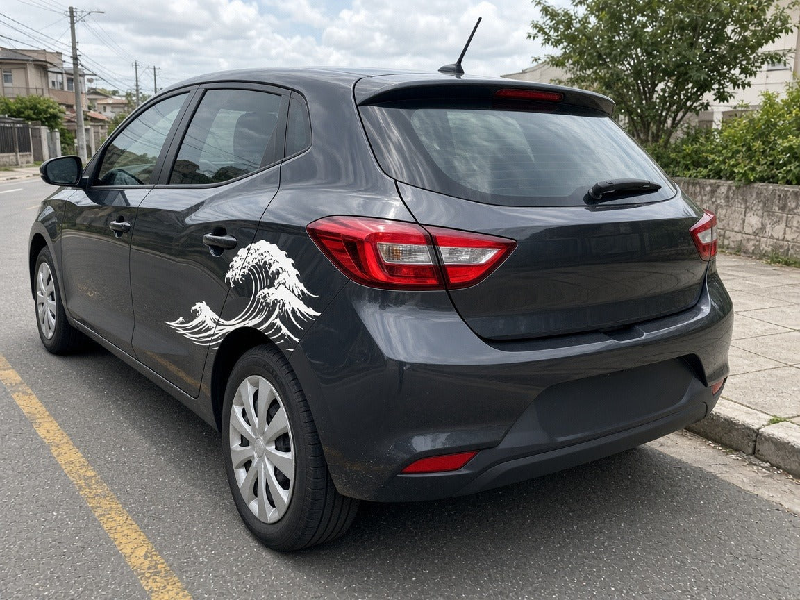 Japanese wave vinyl livery graphics installed on the side of a gray hatchback