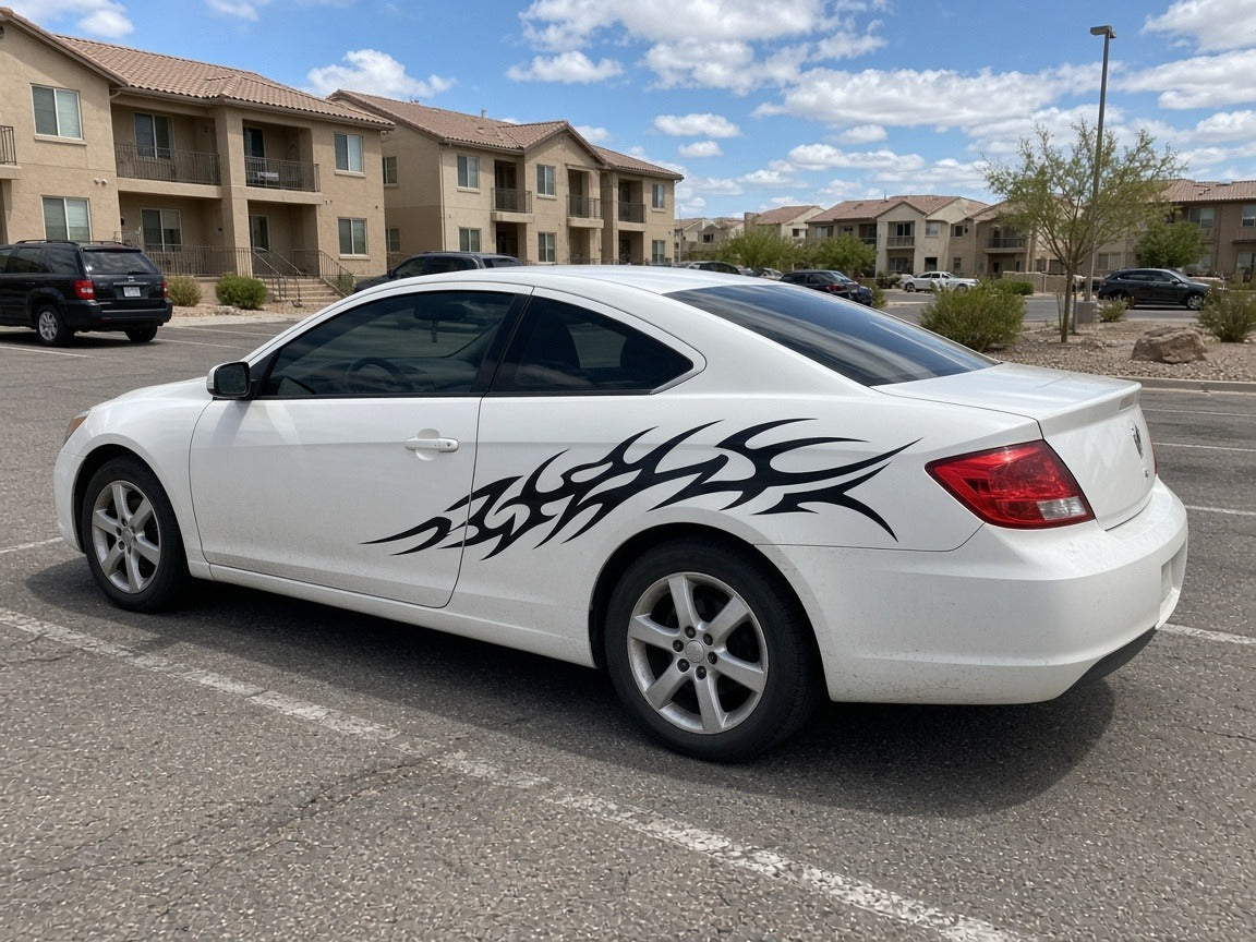 Tribal flame rear quarter vinyl livery installed on a white coupe